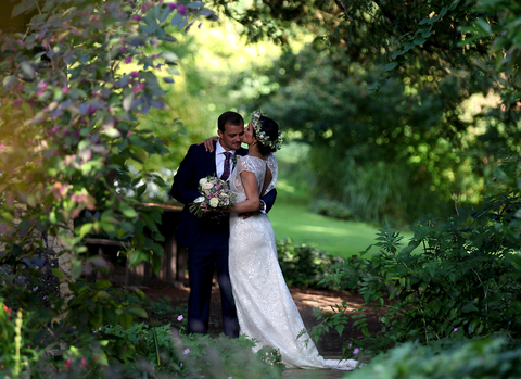 Couple surrounded by trees at Hunton Park